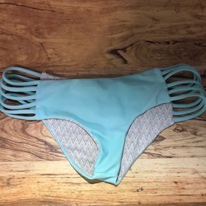 Good condition acacia swim bottoms in sky blue color . Super popular style.